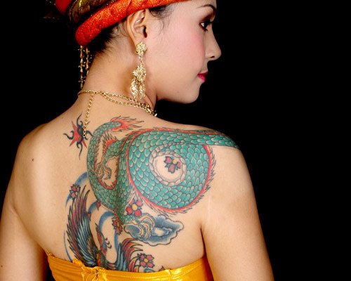 Colored Japanese Dragon Women Tattoo On Back