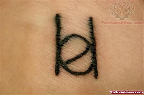 Tattoo of  Alphabet