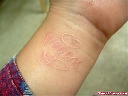White Ink Tattoo On Wrist