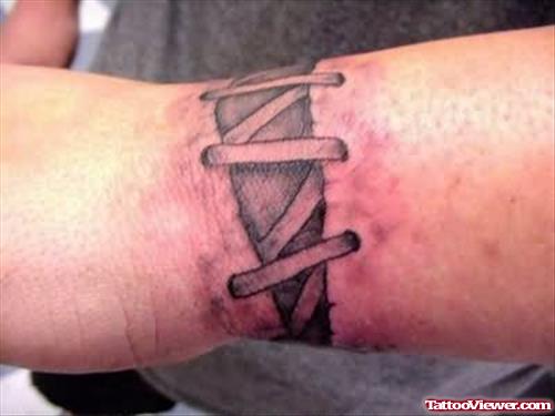 Awesome Stiches Wrist tattoo