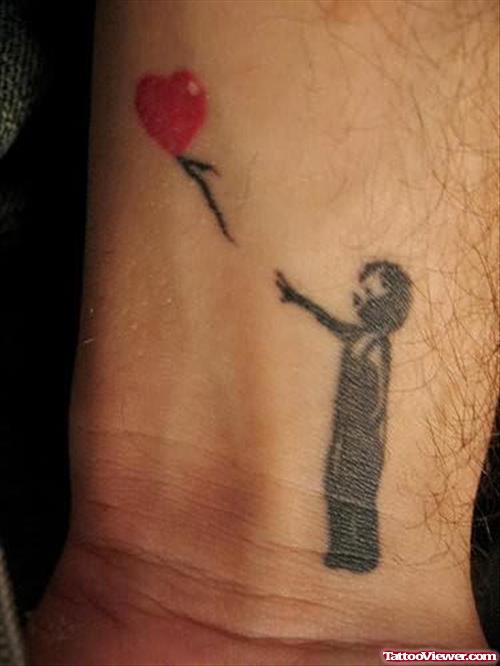 Boy And Heart Balloon Wrist Tattoo