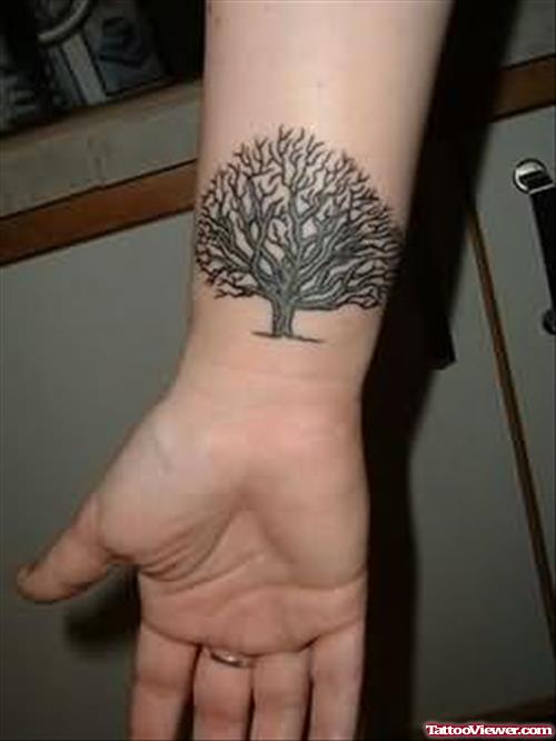 Heavy Tree Tattoo On Wrist