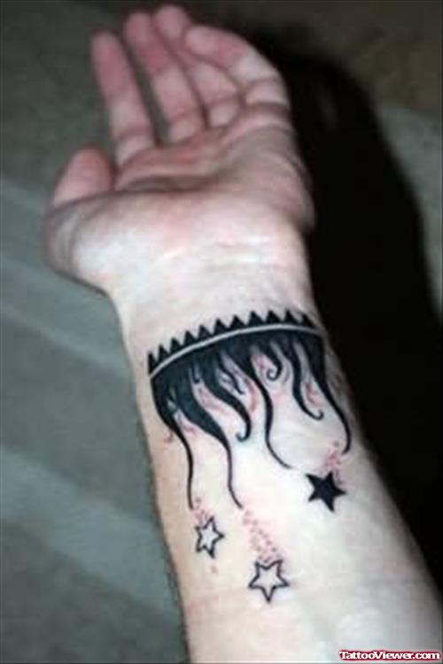 Star And Flames Tattoos For Wrist