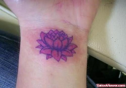 Little Lotus Tattoo On Wrist