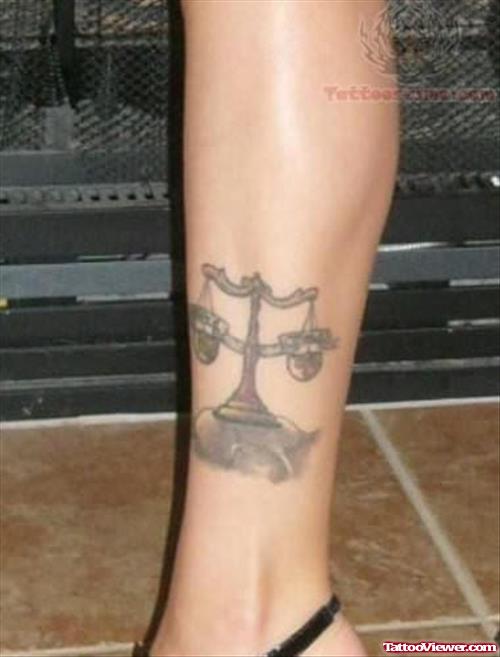 Libra Tattoo Sign on Leg
